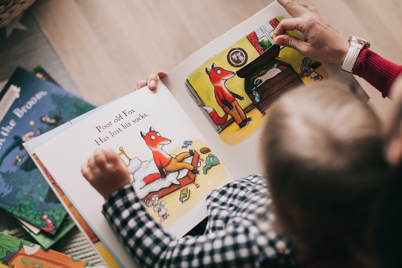 prepare older children sibling: featuring reading book time with baby