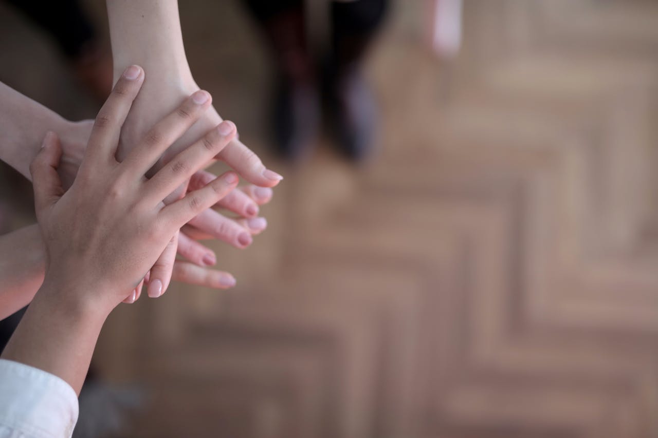 Group-stacking-hands-together