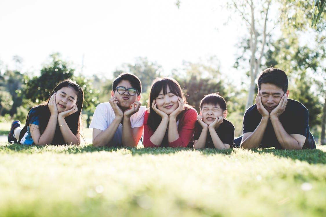 A family enjoying quality time, symbolizing the balance between financial planning, family needs, and future security.